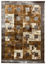 Contemporary cowhide patchwork rug