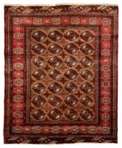 Persian Bokhara red ground rug