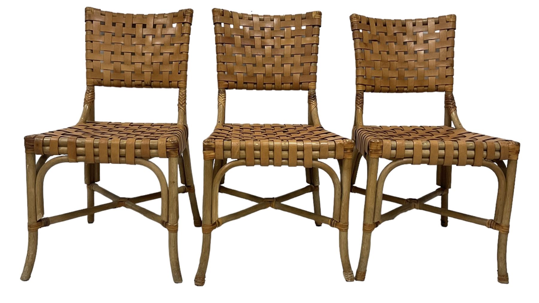 After John McGuire (American 1920-2013) - set of six 20th century bamboo and leather dining chairs