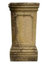 Weathered cast stone pedestal of rectangular form
