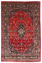 Persian Kashan crimson ground carpet