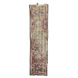 Antique Persian crimson ground runner rug