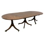 Regency design mahogany triple pillar dining table