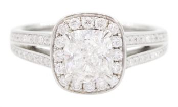 Platinum cushion cut diamond and round brilliant cut diamond cluster ring