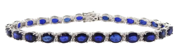 18ct white gold oval cut sapphire and round brilliant cut diamond bracelet