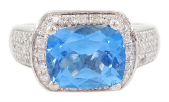 18ct white gold cushion cut blue topaz and diamond ring