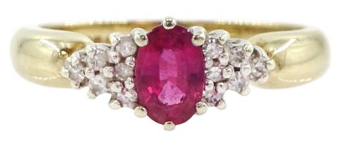 9ct gold oval cut ruby and round brilliant cut diamond cluster ring