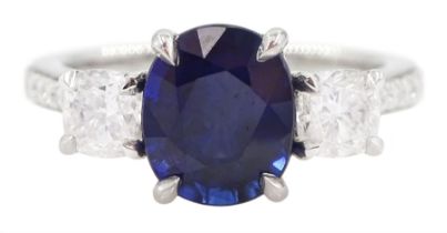 Platinum three stone oval cut sapphire and cushion cut diamond ring