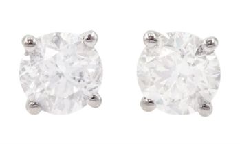 Pair of 18ct white gold round brilliant cut diamond stud earrings