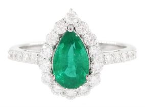 18ct white gold pear cut emerald and round brilliant cut diamond cluster ring