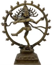 Late 19th century Indian bronze figure of Shiva Nataraja dancing within a flaming halo with one foot