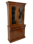 Late Victorian walnut bookcase on cupboard