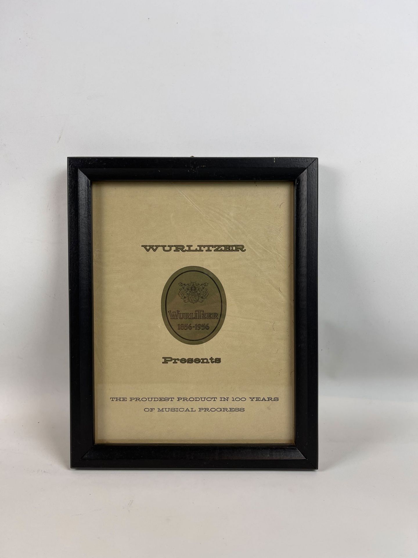 Framed Wurlitzer Presents The Proudest Product in 100 Years Advertisement - Image 2 of 3