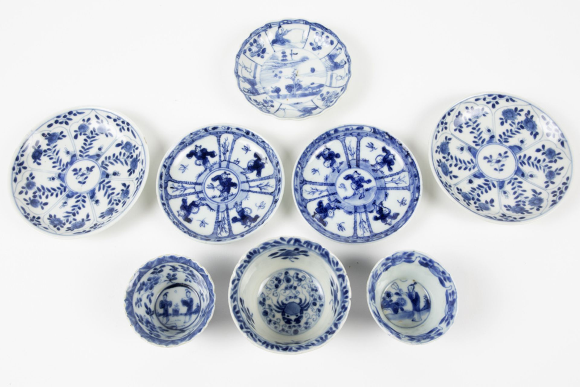 eight pieces of 18th Cent. Chinese porcelain with blue-white decors : five small plates and three