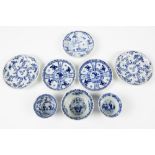 eight pieces of 18th Cent. Chinese porcelain with blue-white decors : five small plates and three