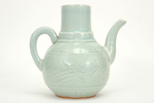 Chinese pitcher in celadon porcelain with underlying decors || Chinese kruik in celadonporselein met