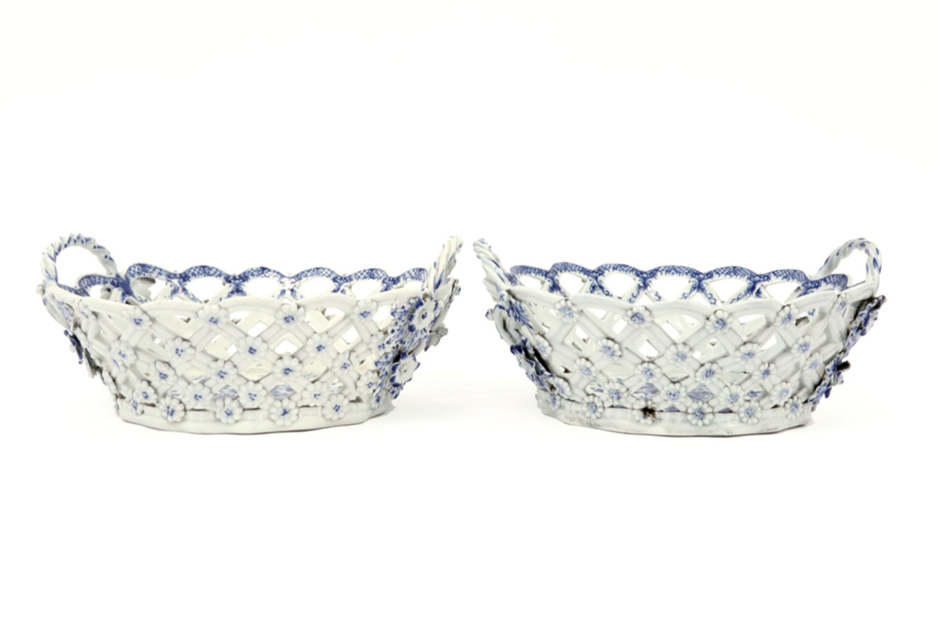 pair of 18th Cent. English Worcester marked baskets in open work ceramic with a blue-white flower - Image 2 of 5