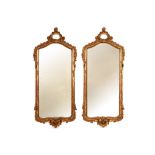 pair of mirrors with antique Louis XV style frames in gilded and sculpted wood || Paar spiegels