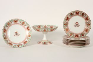 19th Cent. set of two tazzas and six plates in porcelain from Brussels with a polychrome decor and