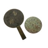 two Chinese mirrors : one in metal from the Qing period and one in bronze from the Han period || Lot