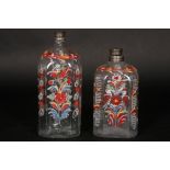 two antique, presumably German, bottles in clear glass with polychrome enamel paintings || Lot van