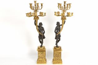 pair of quite big Empire style candelabra in partially gilded bronze each with a woman, who