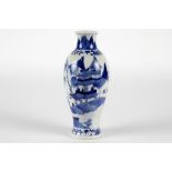 antique Chinese vase in Kang Hsi marked porcelain with a blue-white decor with an animated landscape