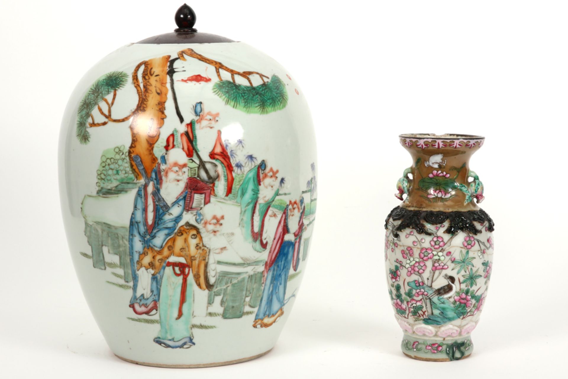 a small Nankin vase and a ginger jar (with wooden lid) in Chinese porcelain with polychrome