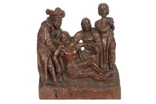 antique sculpture (part of an altarpiece) in oak with four figures || Antieke houtsculptuur (