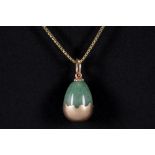 antique presumably Russian pendant in jade and marked 14 karat pink gold (with a maker's mark) -