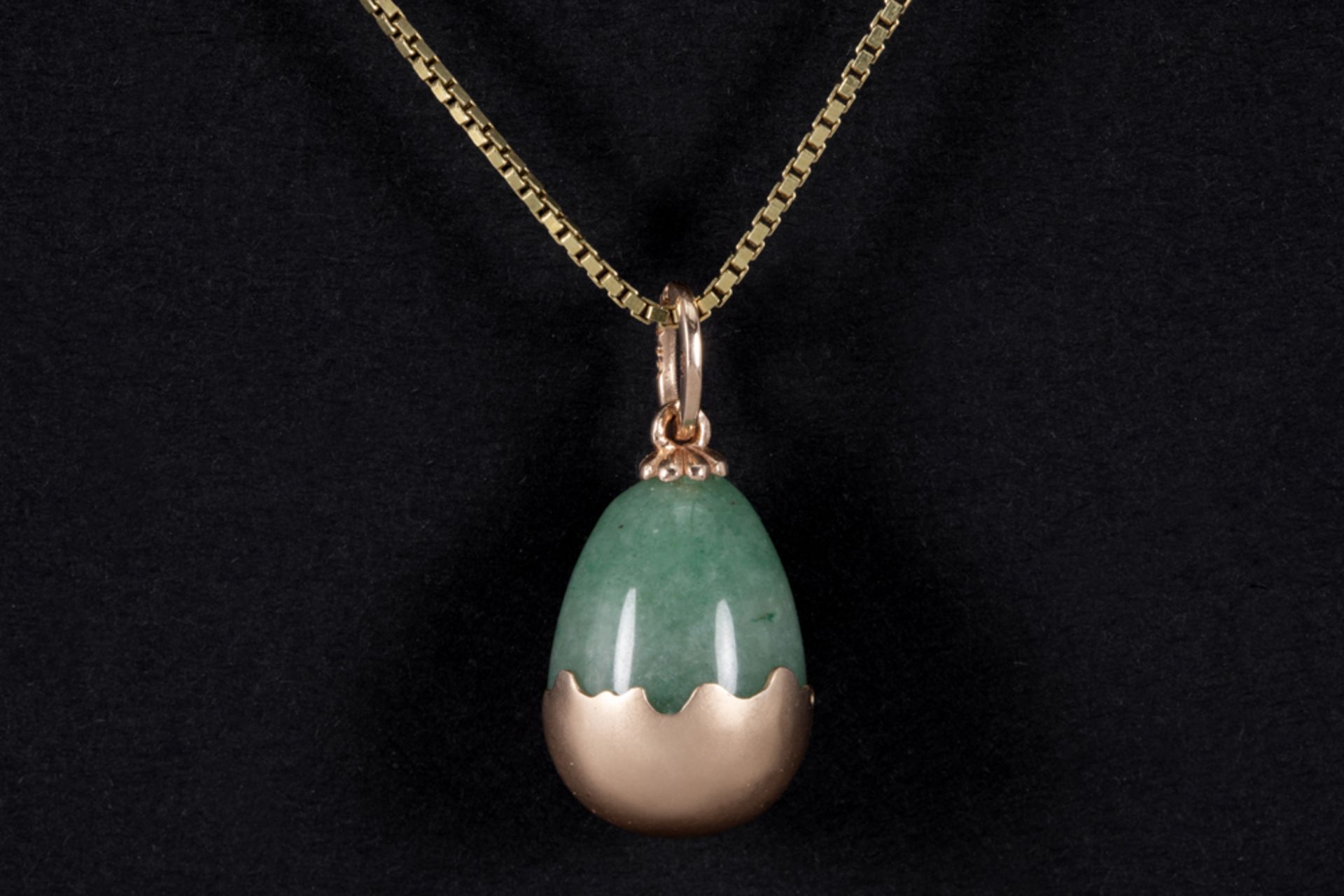 antique presumably Russian pendant in jade and marked 14 karat pink gold (with a maker's mark) -