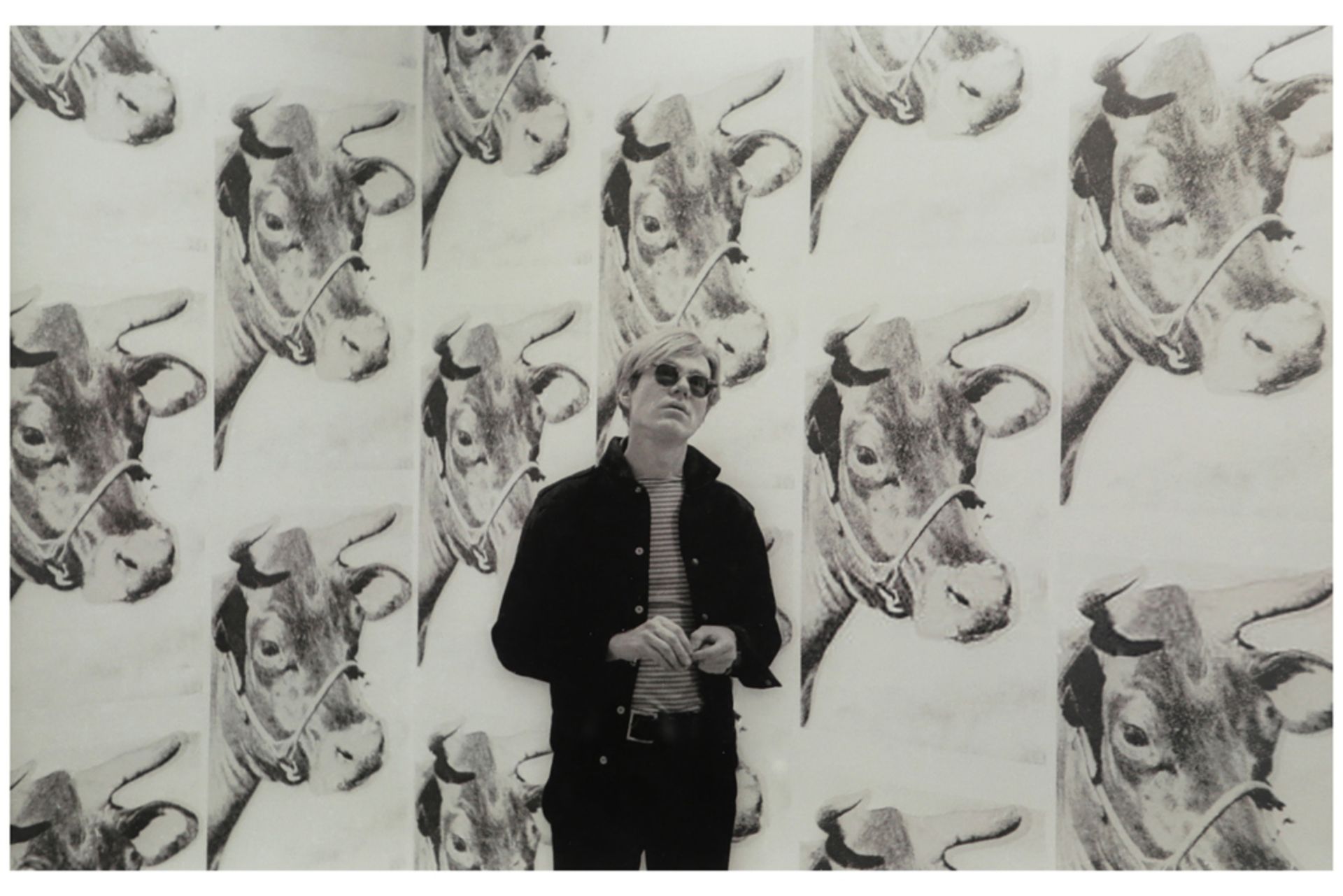photoprint in black and white of Andy Warhol with his iconic cow wallpaper - after the original - Bild 2 aus 2