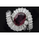 beautiful ring in platinum with a 1,72 carat oval ruby from Thailand or Cambodia surrounded by ca