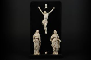 French ensemble of sculptures in ivory, representing the Calvary scene: "Crucified Christ with