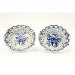 pair of 18th Cent. English Worcester marked baskets in open work ceramic with a blue-white flower