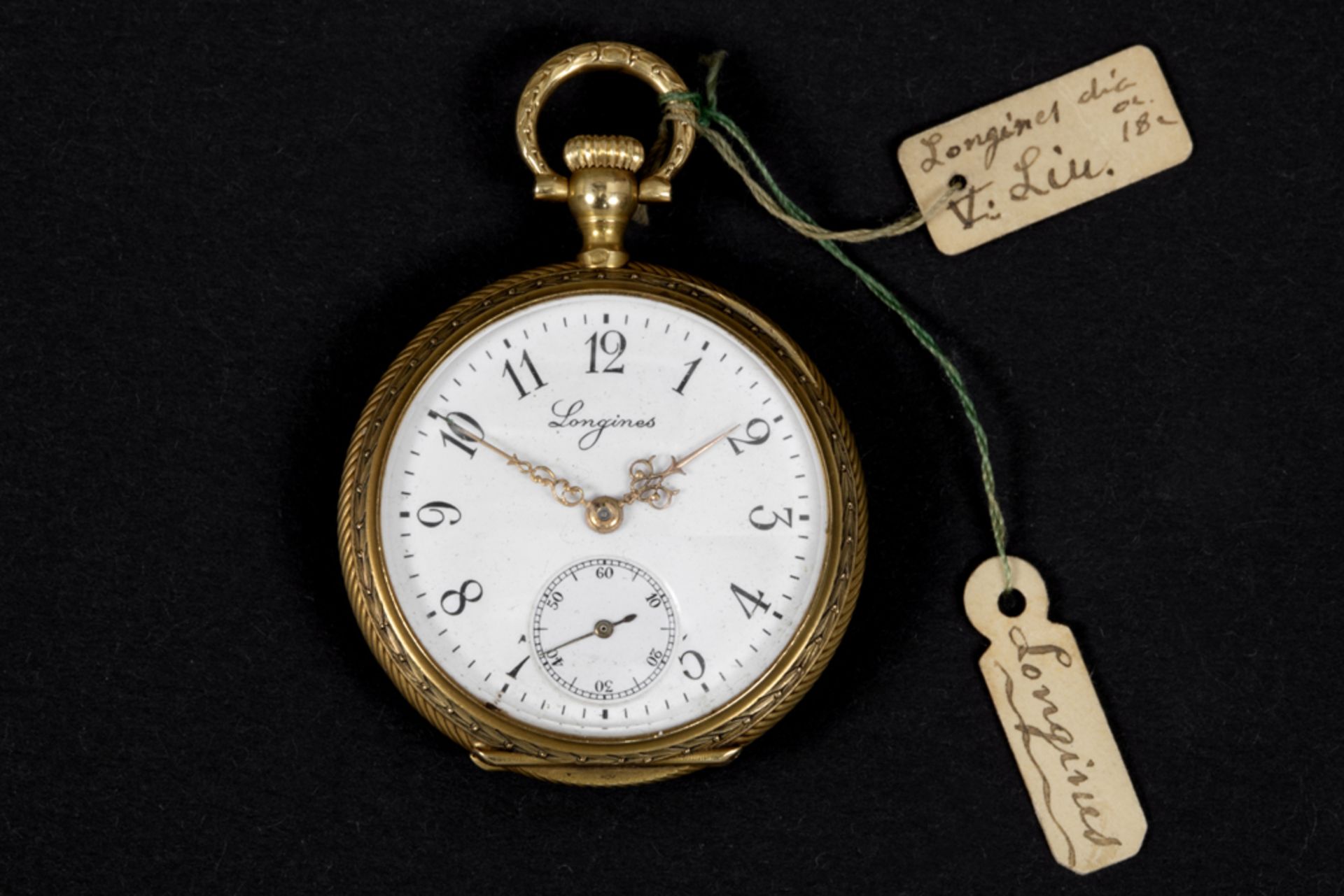 antique Longines marked ladies' pocket watch in yellow gold (18 carat) with its lid with a