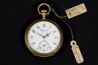 antique Longines marked ladies' pocket watch in yellow gold (18 carat) with its lid with a