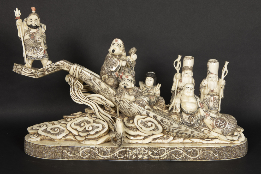 quite big Chinese sculpture with the depiction of seven Chinese mythological figures, sitting on a