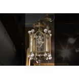 lantern-shaped chandelier in bronze and glass || Lantaarnvormige luster met montuur in brons en