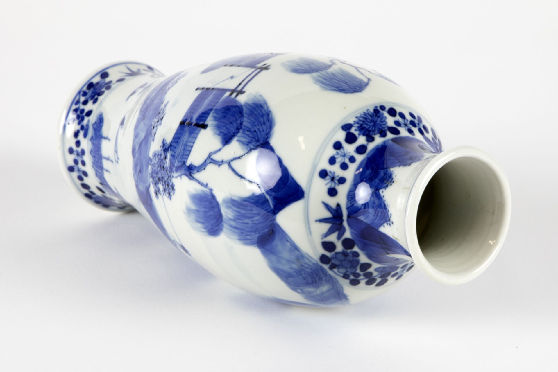 antique Chinese vase in Kang Hsi marked porcelain with a blue-white decor with an animated landscape - Image 3 of 5