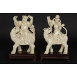 pair of antique Chinese late Qing period sculptures in finely carved ivory with a nice patina and