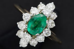 seventies' cocktail ring in yellow and white gold (18 carat) with a more then 1 carat oval emerald