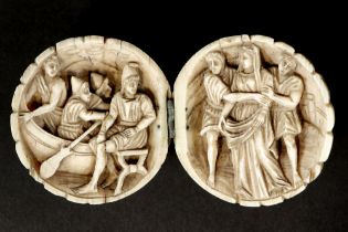 'antique' fluted, spherical European sculpture in ivory, which when opened shows a double scene with