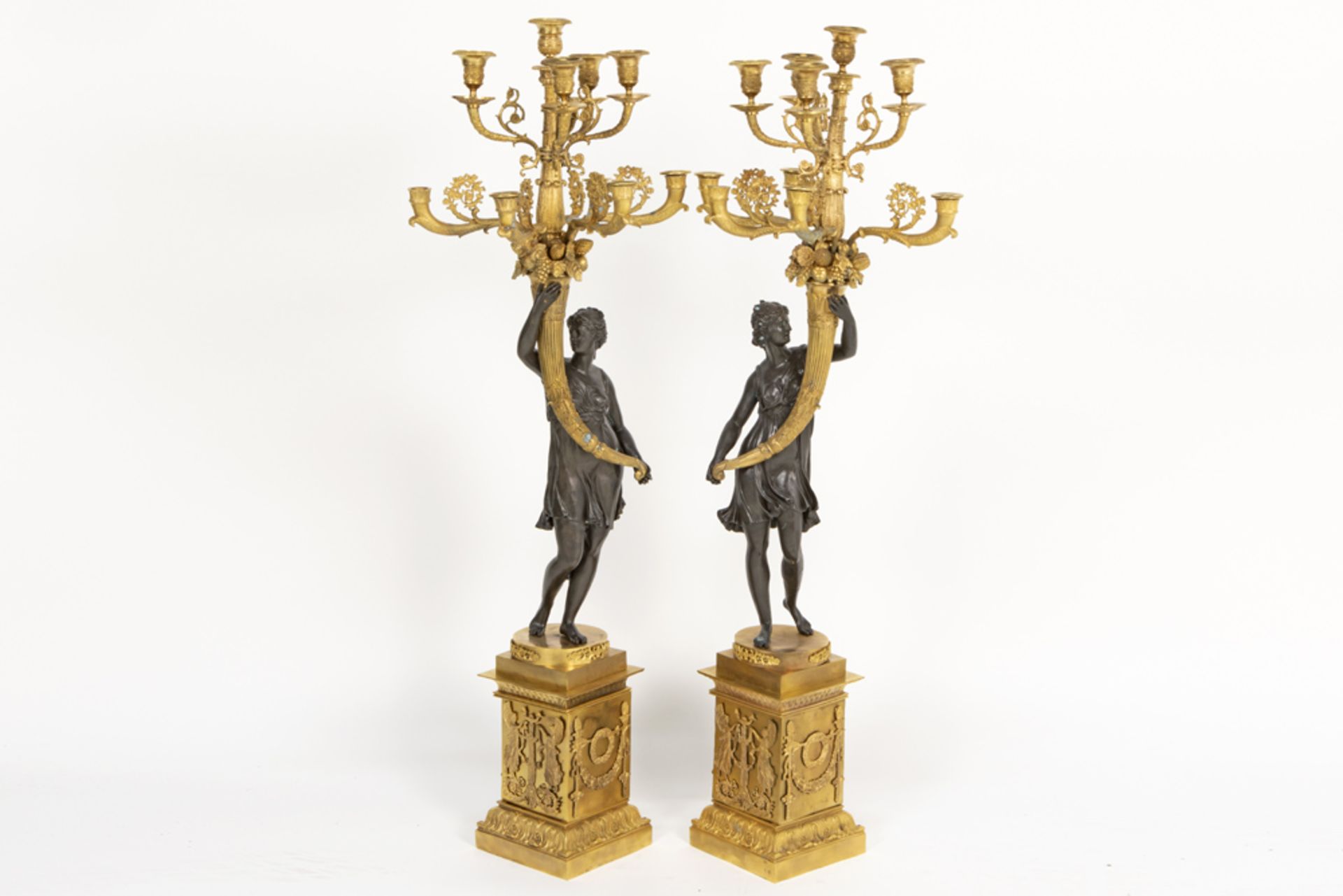 pair of quite big Empire style candelabra in partially gilded bronze each with a woman, who - Bild 2 aus 4