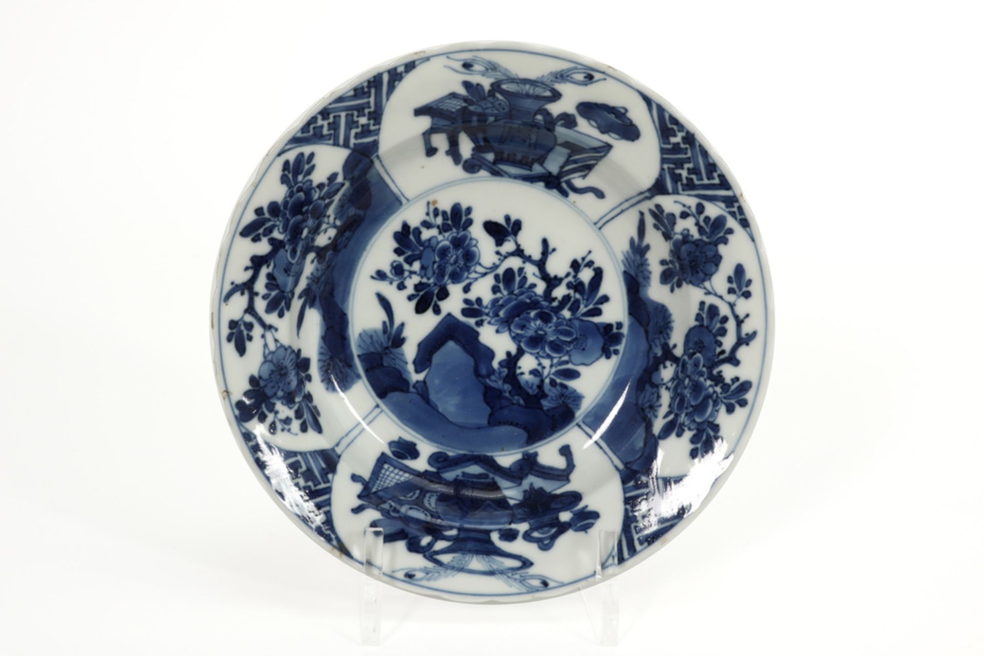 17th/18th Cent. Chinese Kang Hsi period plate in marked porcelain with a blue-white garden