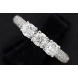 ring in white gold (18 carat) with ca 0,25 carat of small very high quality brilliant cut diamonds