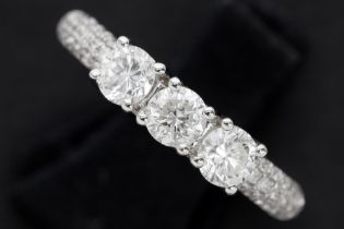 ring in white gold (18 carat) with ca 0,25 carat of small very high quality brilliant cut diamonds