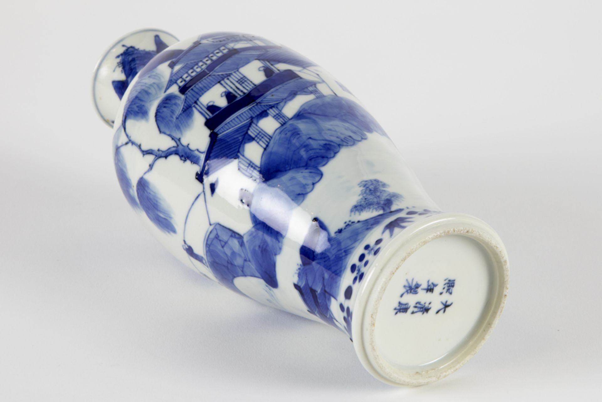 antique Chinese vase in Kang Hsi marked porcelain with a blue-white decor with an animated landscape - Image 4 of 5