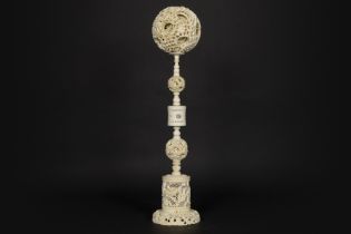 late 19th/early 20th Cent. Chinese "Canton ball" on a richly sculpted base with small Canton ball