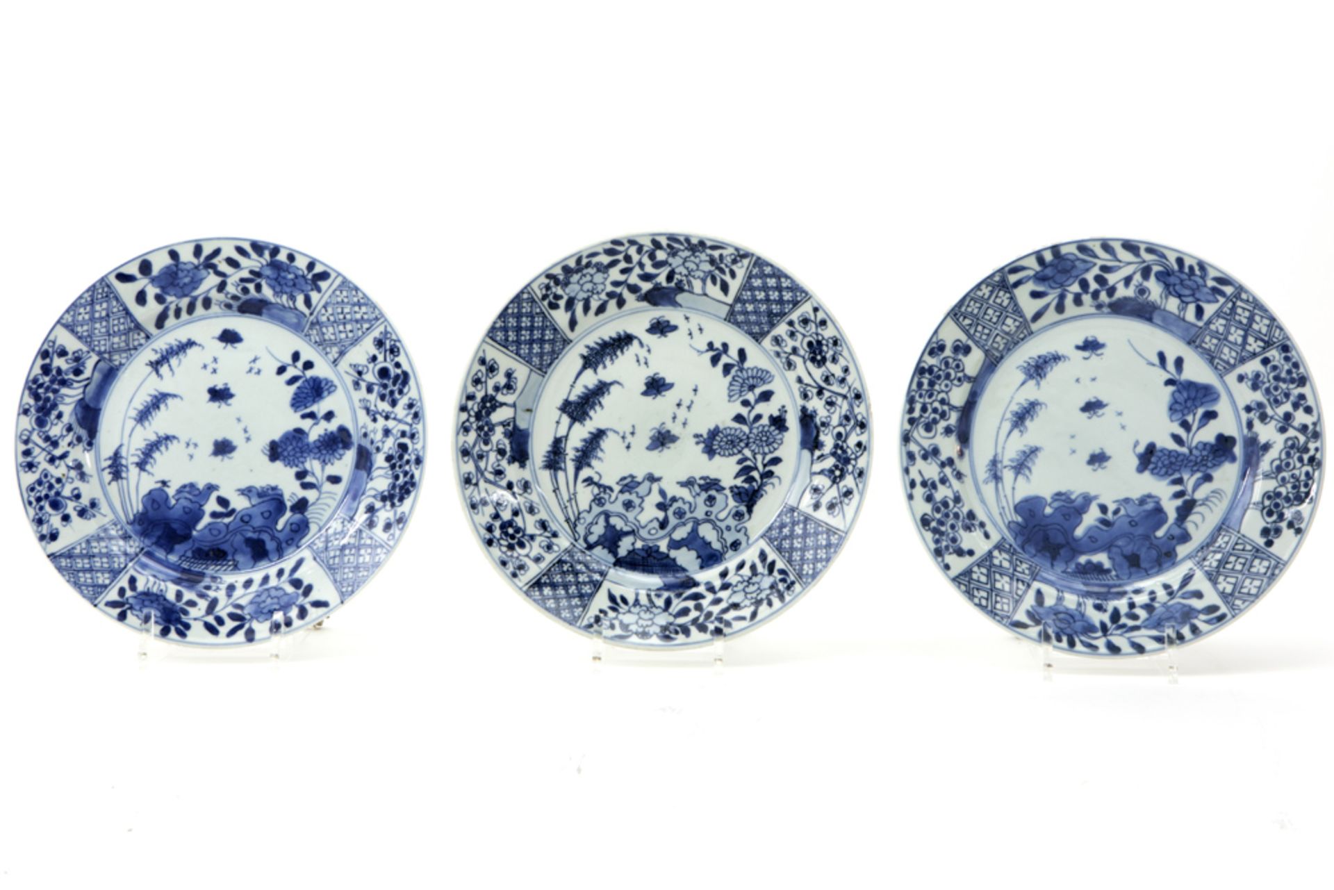 series of three 18th Cent. Chinese plates in porcelain with a blue-white decor with birds and